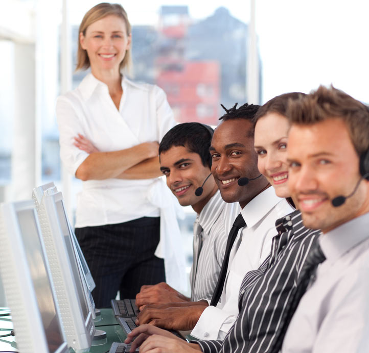 Canadian call centre team using VoIP headsets and computers